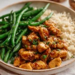 Honey Garlic Chicken with Green Beans served on a plate