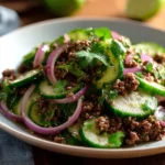 Delicious Spicy Korean Ground Beef served with a refreshing cucumber salad