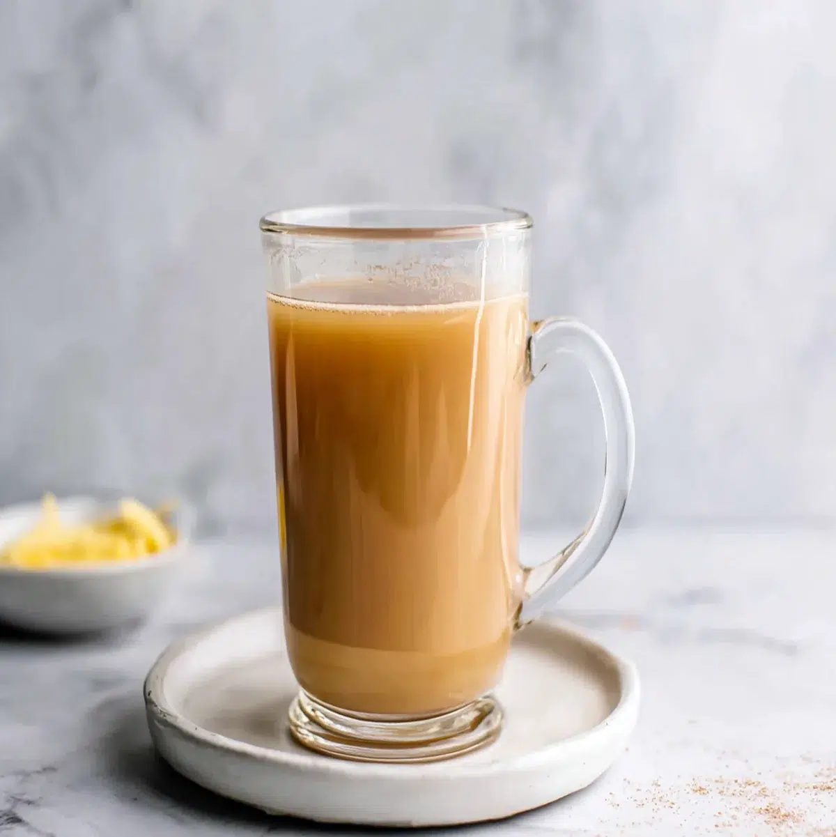 Overhead view of a teriyaki meatball dinner spread with rice, vegetables, and dipping sauce