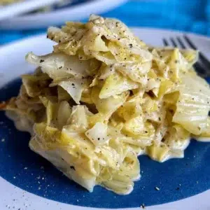 Creamy Alfredo with Cabbage 3 Bowl of Creamy Alfredo with Cabbage topped with parsley and parmesan cheese