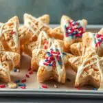 Stars and stripes cereal treats with white chocolate drizzle and red, white, and blue sprinkles