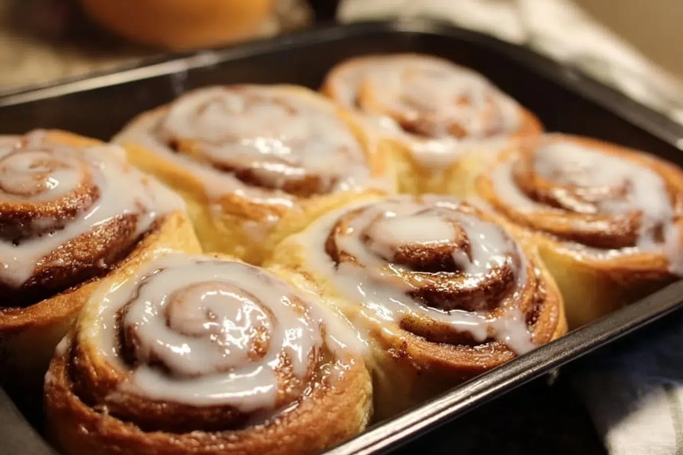 Freshly baked homemade cinnamon rolls with icing on top