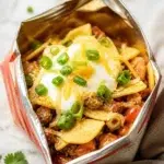 Delicious Walking Tacos served in a bag with toppings and ingredients