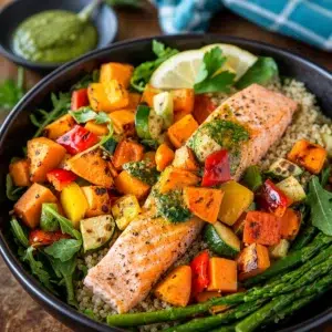 5 Deliciously Easy Roasted Salmon Potato Bowl Recipes You'll Love 9 Roasted salmon potato bowl featuring vibrant veggies and healthy sweet potatoes.
