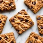 Delicious banana oatmeal breakfast bars, soft-baked and wholesome, ideal for quick snacks.