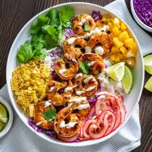 7 Scrumptious Shrimp Taco Bowls You’ll Love to Make 6 Colorful shrimp taco bowl with cilantro-lime rice, vibrant toppings, and fresh shrimp.